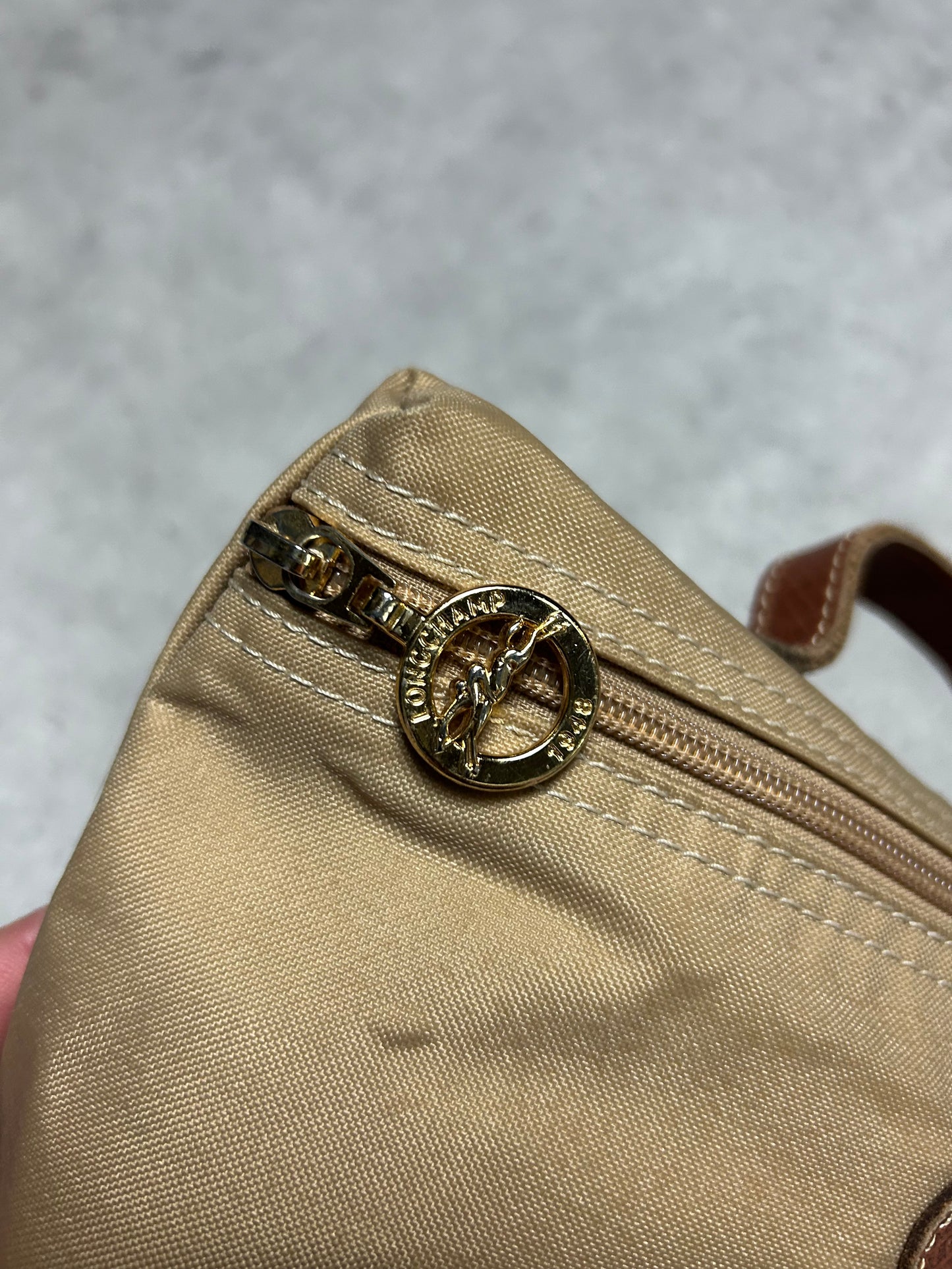 Pochette Longchamp en toile beige trousse pliage